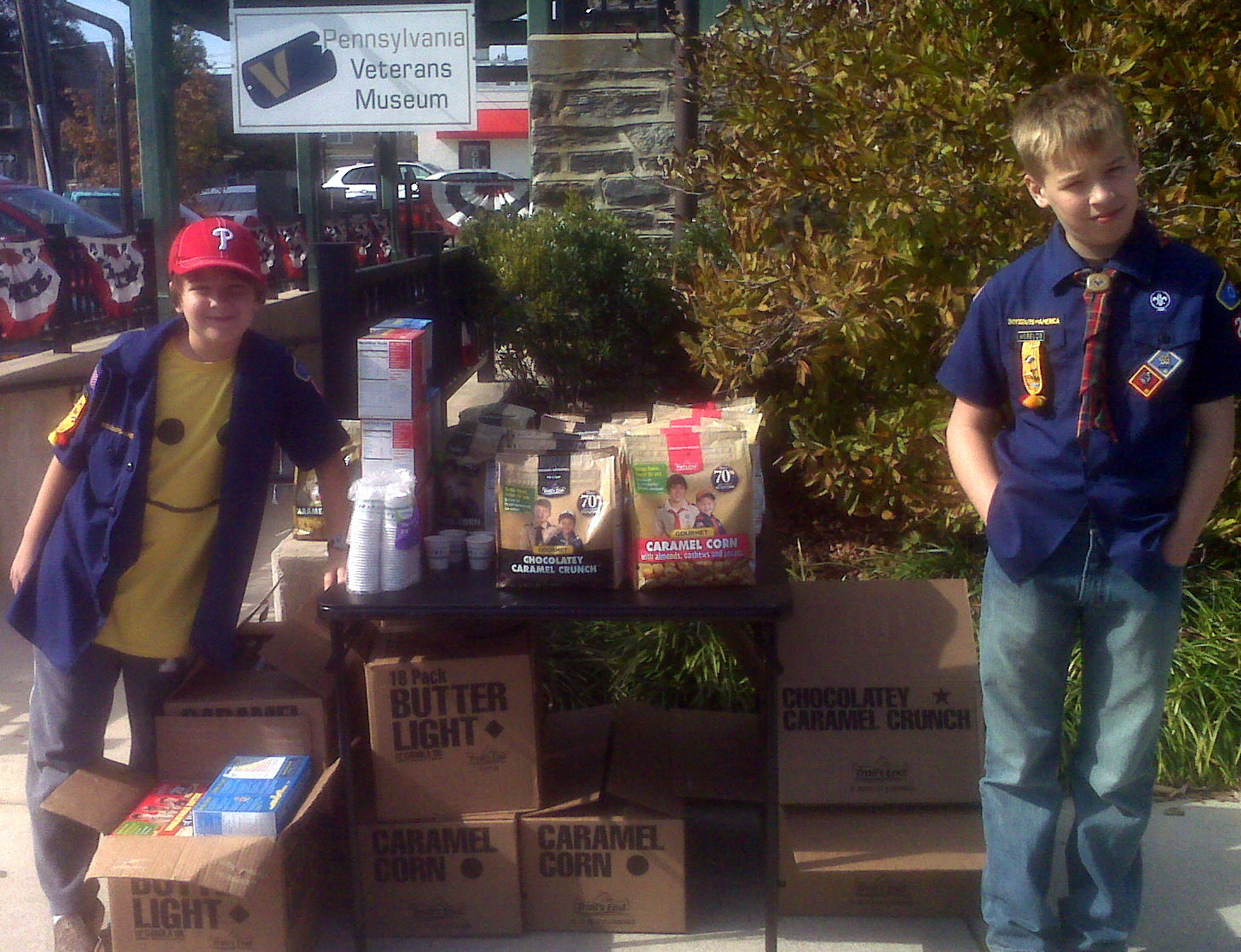 What do Boy Scouts raise money for when they sell popcorn?
